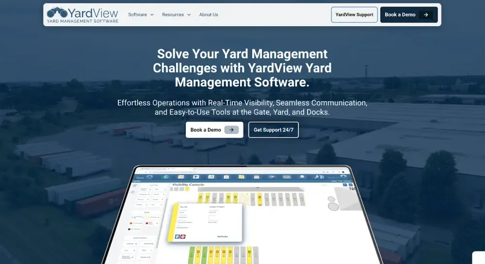 YardView yard management software interface displayed on screen with background of warehouse and trailer yard operations